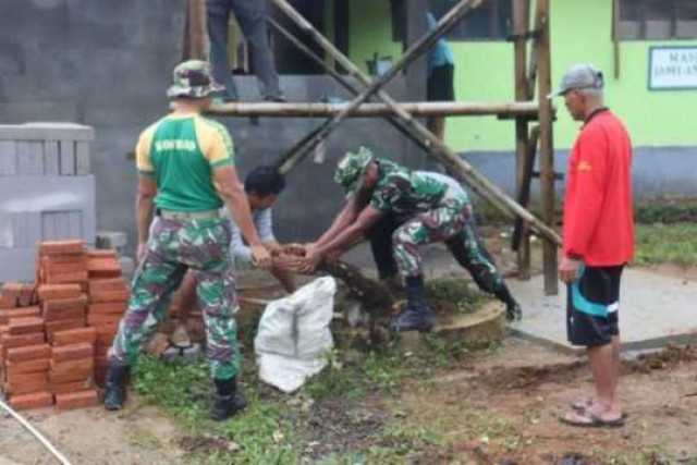 Akselerasi Pembangunan, Yonarmed 13 Nanggala Ikuti Giat TMMD 