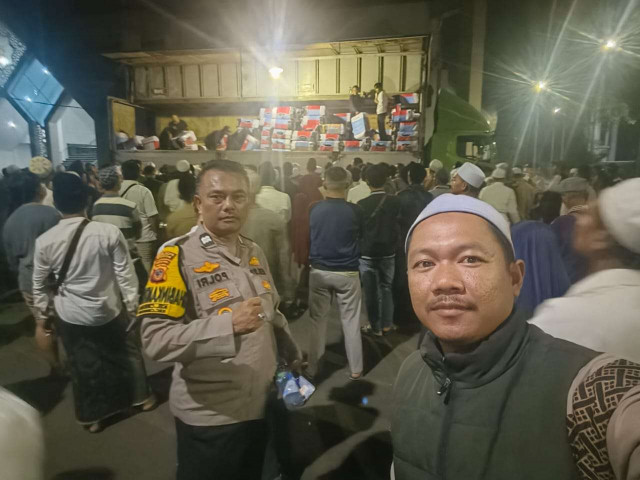 Polsek Cibinong laksanakan Pengamanan Kepulangan Jemaah Haji Asal Kabupaten Bogor.