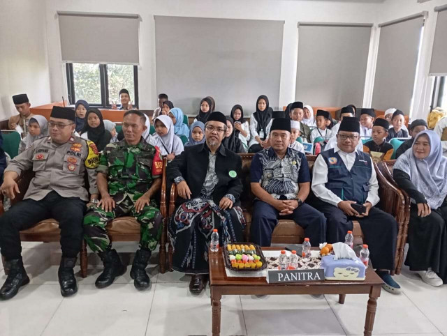 Bhabinkamtibmas Hadiri MTQ Tingkat Kelurahan, Wujudkan Sinergitas Polri dan Masyarakat.