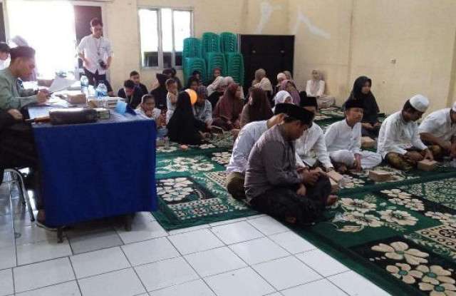 Bhabinkamtibmas Polsek Ciampea Monitoring Lomba MTQ Tingkat Desa Bojongrangkas.