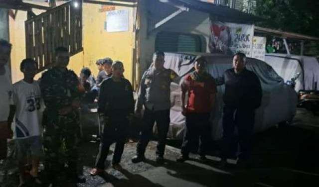 Bhabinkamtibmas Polsek Ciampea Bersama Babinsa Kontrol Ronda Malam, Sampaikan Pesan Kamtibmas