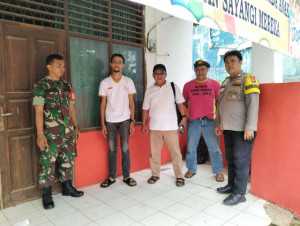 Bhabinkamtibmas Polsek Parung Bersinergi dengan TNI dalam Menjaga Kamtibmas di Desa Binaan.