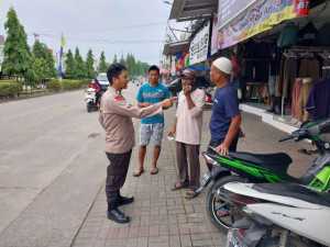 Bhabinkamtibmas Desa Kabasiran Polsek Parungpanjang Berikan Pembinaan Linmas, Tekankan Peran Aktif Masyarakat dalam Jaga Kamtibmas.