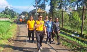 Sambang Desa Sambil Jalan Sehat, TNI-POLRI Perkuat Sinergi Jaga Kamtibmas Jelang HUT Bhayangkara ke-79.