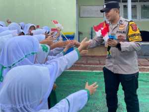 Bhabinkamtibmas Desa Sanja Hadiri RKP Desa, Wujudkan Sinergi TNI-Polri dan Forkopimdes