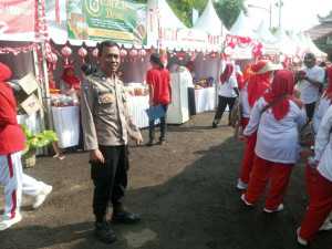 Bhabinkamtibmas Polsek Citeureup Ikuti Pasar Murah dan Edukasi Warga Agar Menjaga Lingkungan Tetap Kondusif