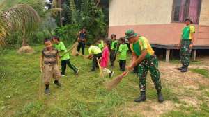 Tanamkan Kepedulian Lingkungan Sejak Dini, Pos Perumbang Satgas Yonarmed 13/Nanggala Gelar Kerja Bakti Bersama Siswa SDN 04 Kekurak