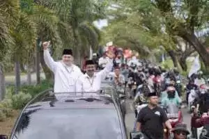 Arham - Rahmat resmi mendaftar di KPU, Rimbuan Simpatisan dan Pendukung Ikut Mengawal