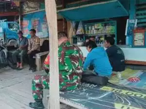 Bersinergi Bhabinkamtibmas Polsek Parung dan Babinsa Koramil 0621/22 beri himbauan Kamtibmas kepada warga.